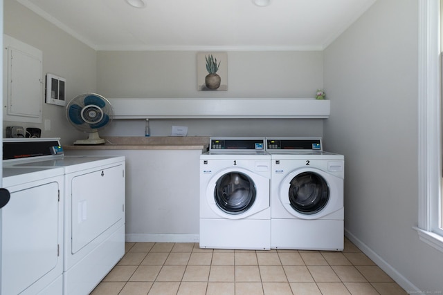 22 River Colony, Guilford, CT 06437 - community laundry room featuring washer and clothes dryer, crown molding, and light tile patterned floors