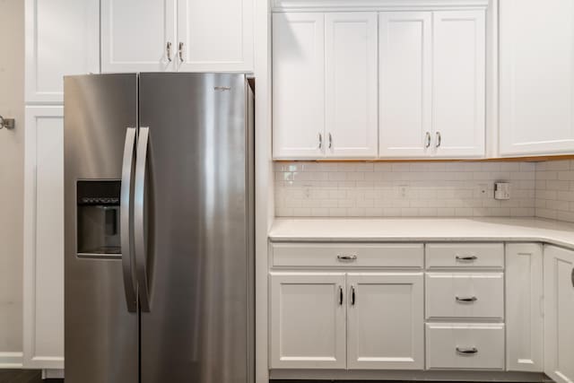 802 Center Meadow Ln Unit 802, Danbury, CT 06810 - kitchen with stainless steel fridge, light countertops, and white cabinetry