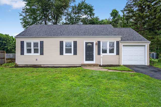 6 Crescent Dr, Danbury, CT 06810 - view of front of home with a garage, asphalt driveway, and a shingled roof