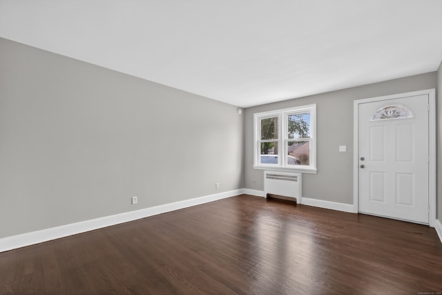 6 Crescent Dr, Danbury, CT 06810 - foyer entrance with radiator heating unit and dark wood finished floors