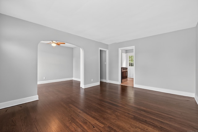 6 Crescent Dr, Danbury, CT 06810 - spare room featuring arched walkways, ceiling fan, and wood finished floors