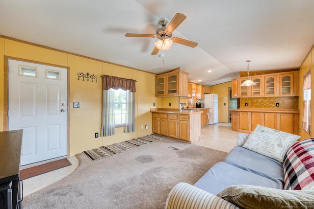 60 Lions Way, Windham, CT 06256 - living room featuring a ceiling fan, lofted ceiling, and light colored carpet