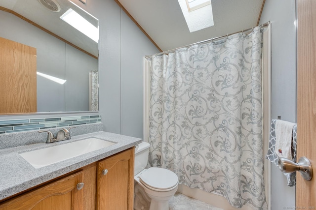 60 Lions Way, Windham, CT 06256 - full bath with a skylight, vaulted ceiling, vanity, tile patterned floors, and tasteful backsplash