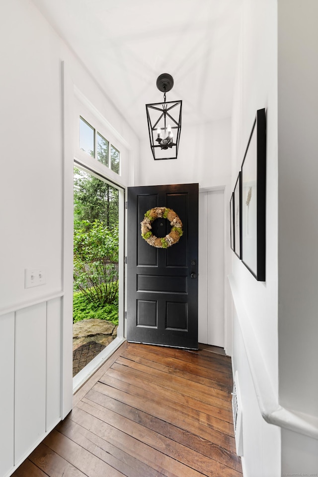 47 Godfrey Rd W, Weston, CT 06883 - entrance foyer with a chandelier and wood-type flooring
