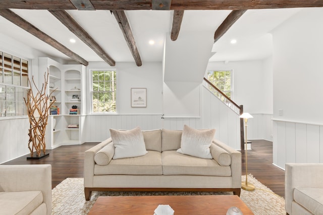 47 Godfrey Rd W, Weston, CT 06883 - living area featuring wood finished floors, wainscoting, healthy amount of natural light, beamed ceiling, and recessed lighting