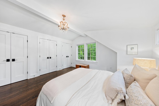 47 Godfrey Rd W, Weston, CT 06883 - bedroom with two closets, dark wood-type flooring, and a chandelier