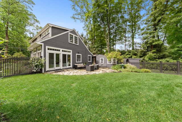 47 Godfrey Rd W, Weston, CT 06883 - back of property featuring an outdoor living space, a fenced backyard, french doors, and a patio area