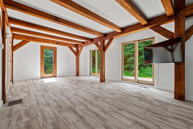 122 Old Post Rd, Old Saybrook, CT 06475 - unfurnished living room featuring beamed ceiling and wood finished floors