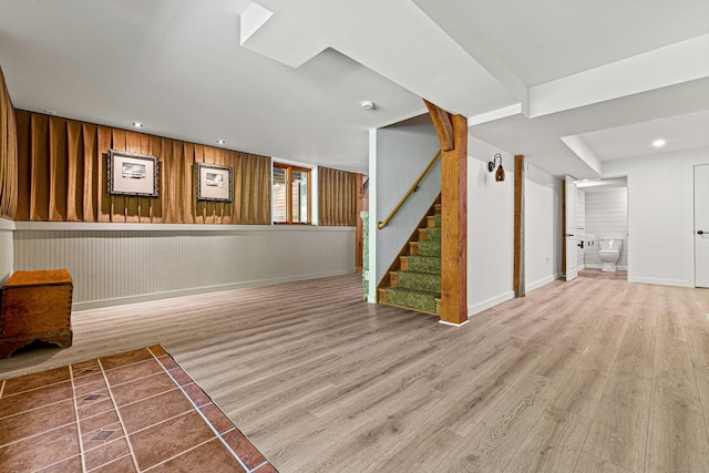 122 Old Post Rd, Old Saybrook, CT 06475 - unfurnished living room featuring wood finished floors, stairs, and recessed lighting