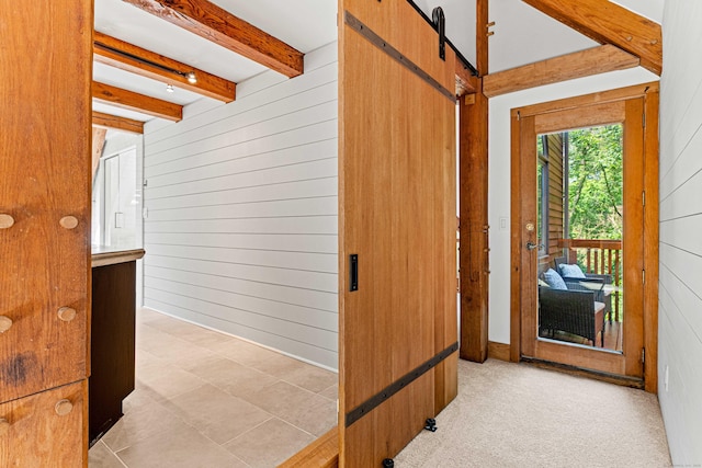 122 Old Post Rd, Old Saybrook, CT 06475 - hall featuring wooden walls, beamed ceiling, and a barn door