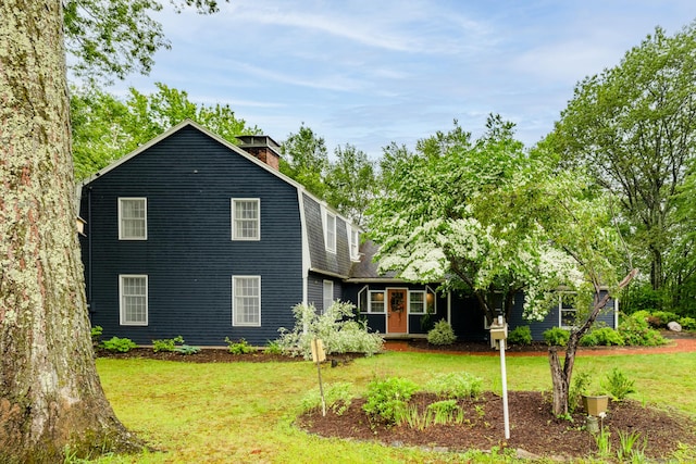65 Nassahegan Dr, Burlington, CT 06013 - rear view of house with a yard and a chimney