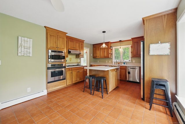 65 Nassahegan Dr, Burlington, CT 06013 - kitchen with appliances with stainless steel finishes, a baseboard radiator, light countertops, and under cabinet range hood