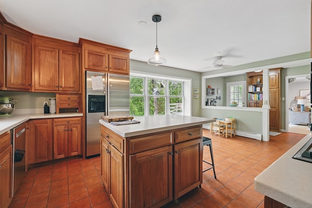 65 Nassahegan Dr, Burlington, CT 06013 - kitchen with appliances with stainless steel finishes, tile patterned flooring, and plenty of natural light