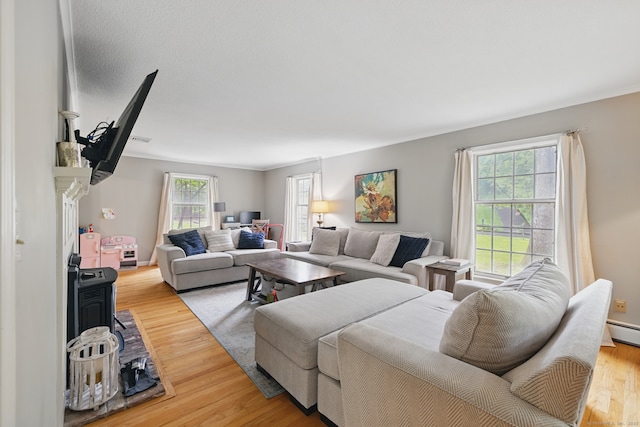 65 Nassahegan Dr, Burlington, CT 06013 - living area with healthy amount of natural light and wood finished floors