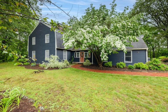 65 Nassahegan Dr, Burlington, CT 06013 - view of front of home featuring a front yard and a shingled roof