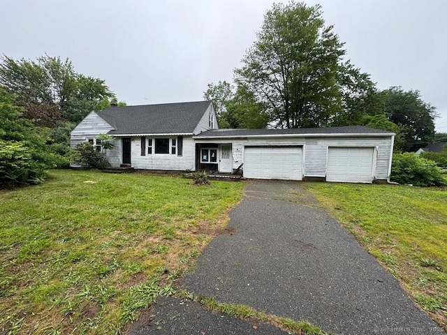 4 Lox Ln, Enfield, CT 06082 - view of front of property featuring a front yard and an attached garage