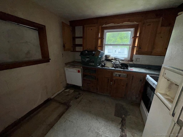4 Lox Ln, Enfield, CT 06082 - kitchen featuring white appliances and brown cabinetry