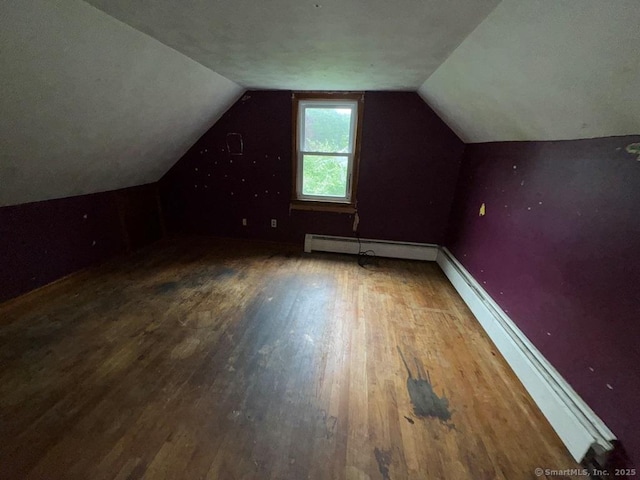 4 Lox Ln, Enfield, CT 06082 - bonus room with wood finished floors, lofted ceiling, and baseboard heating