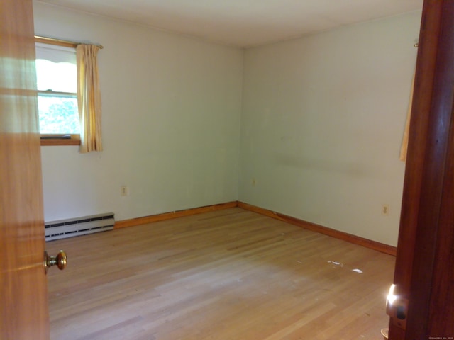 152 Old Mill Rd, Middletown, CT 06457 - spare room with baseboard heating and light wood-style flooring