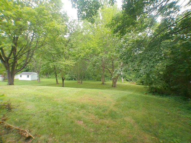 152 Old Mill Rd, Middletown, CT 06457 - view of green lawn featuring an outbuilding