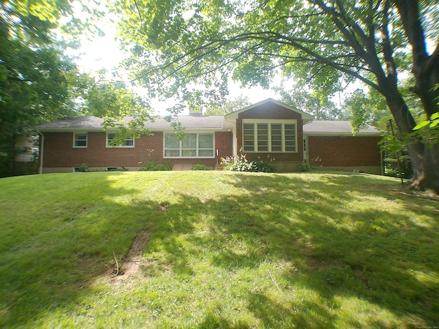 152 Old Mill Rd, Middletown, CT 06457 - back of property with brick siding and a yard