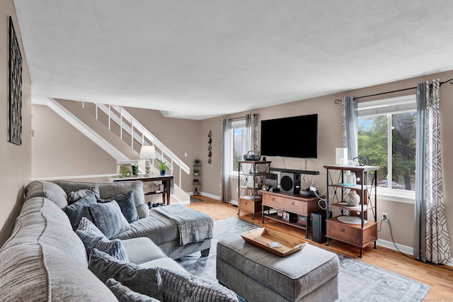 70 Trolley Crossing Ln Unit 70, Middletown, CT 06457 - living area featuring stairway and wood finished floors