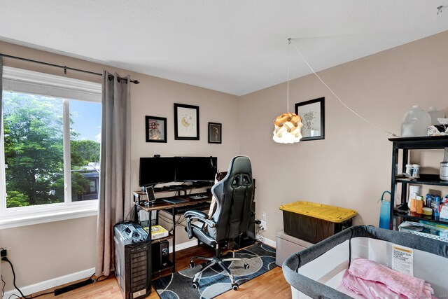 70 Trolley Crossing Ln Unit 70, Middletown, CT 06457 - home office with baseboards and wood finished floors