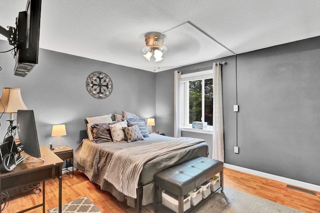 70 Trolley Crossing Ln Unit 70, Middletown, CT 06457 - bedroom featuring wood finished floors and a desk