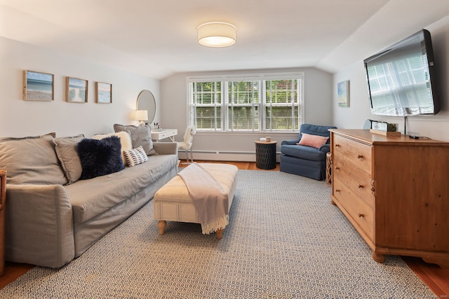 37 Woodridge Cir, New Canaan, CT 06840 - living area featuring a baseboard radiator, lofted ceiling, and light wood-style flooring