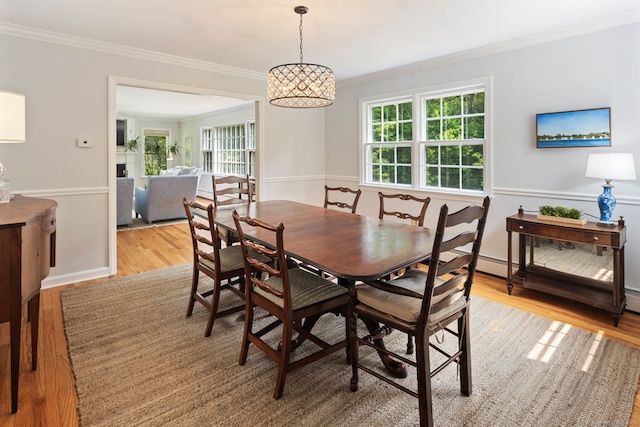 37 Woodridge Cir, New Canaan, CT 06840 - dining room featuring crown molding, wood finished floors, and a chandelier
