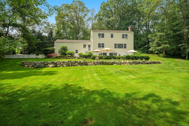 37 Woodridge Cir, New Canaan, CT 06840 - rear view of property with a chimney