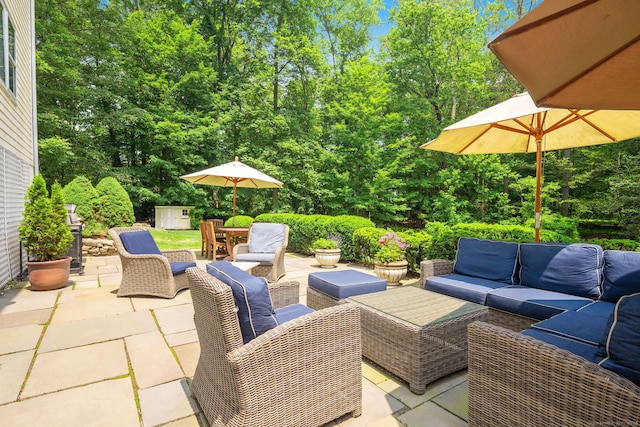 37 Woodridge Cir, New Canaan, CT 06840 - view of patio / terrace featuring an outdoor living space and a shed