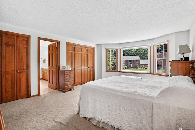 175 Wrights Brook Dr, Somers, CT 06071 - bedroom featuring carpet, a textured ceiling, and ensuite bathroom