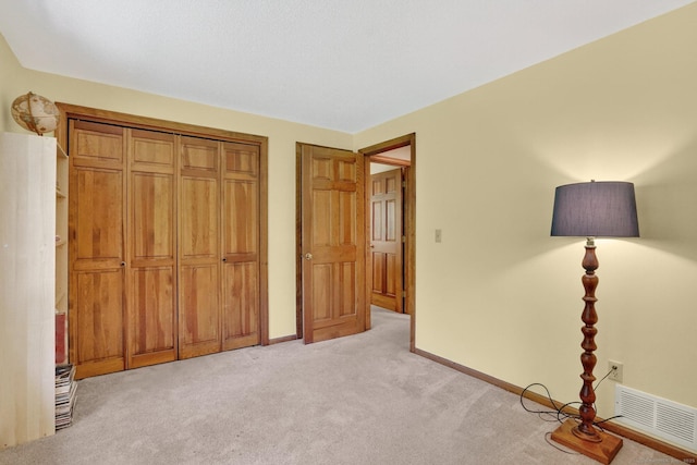 175 Wrights Brook Dr, Somers, CT 06071 - unfurnished bedroom featuring light colored carpet and a closet