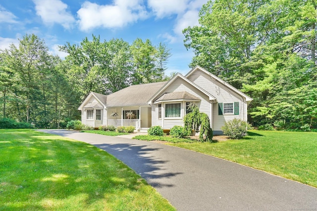 175 Wrights Brook Dr, Somers, CT 06071 - view of front facade featuring covered porch and a front yard