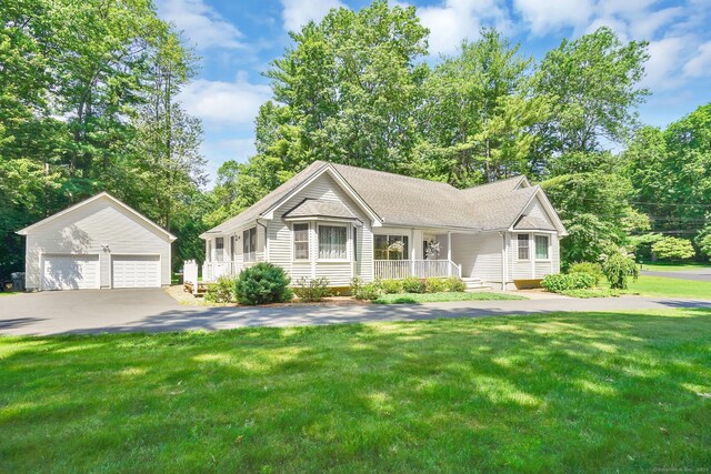 175 Wrights Brook Dr, Somers, CT 06071 - ranch-style home featuring an outbuilding, a detached garage, a porch, and a front yard
