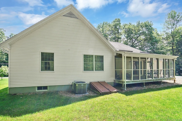 175 Wrights Brook Dr, Somers, CT 06071 - back of house featuring a sunroom and a lawn