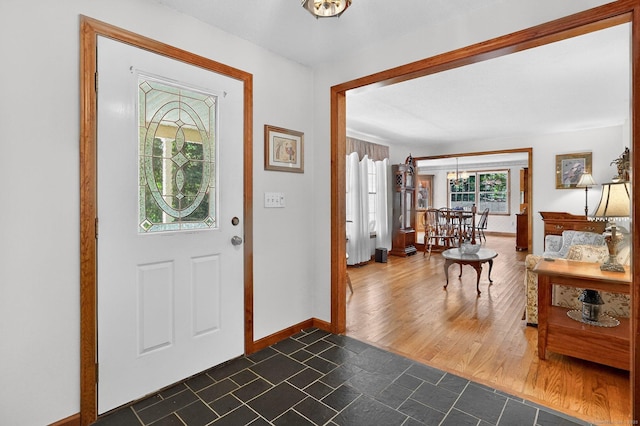 175 Wrights Brook Dr, Somers, CT 06071 - entrance foyer with baseboards and a chandelier