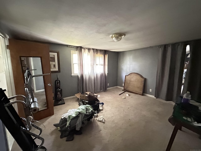 55 Kenwood Cir, Bloomfield, CT 06002 - bedroom with baseboards and light colored carpet