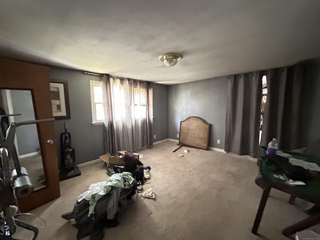 55 Kenwood Cir, Bloomfield, CT 06002 - interior space featuring baseboards and light carpet