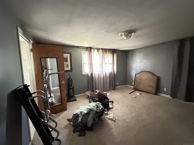 55 Kenwood Cir, Bloomfield, CT 06002 - workout room with light carpet and baseboards