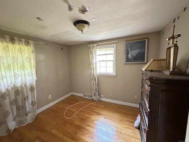 55 Kenwood Cir, Bloomfield, CT 06002 - unfurnished bedroom featuring light wood-type flooring and baseboards