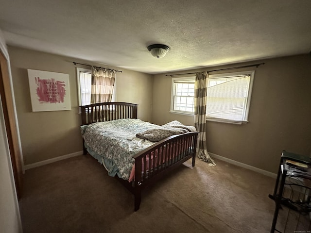 55 Kenwood Cir, Bloomfield, CT 06002 - carpeted bedroom featuring baseboards and a textured ceiling