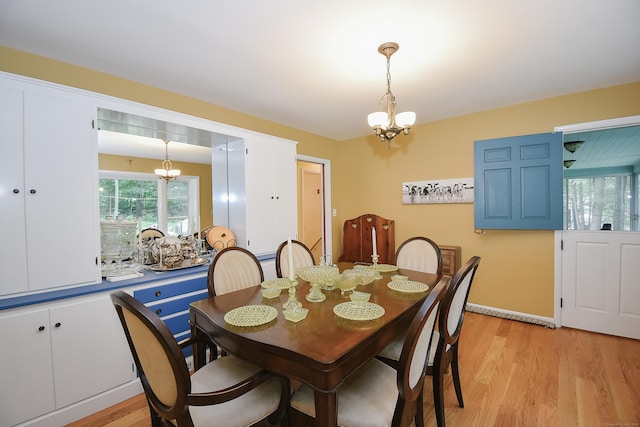 100 Ridgebrook Rd, Torrington, CT 06790 - dining area with a chandelier and light wood-type flooring