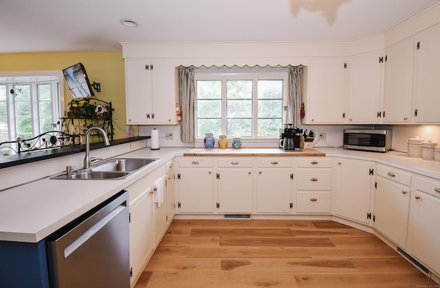 100 Ridgebrook Rd, Torrington, CT 06790 - kitchen featuring stainless steel appliances, a sink, a peninsula, white cabinetry, and recessed lighting