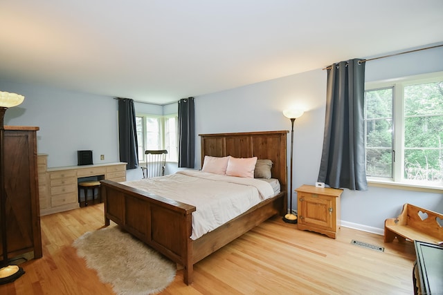 100 Ridgebrook Rd, Torrington, CT 06790 - bedroom featuring light wood-type flooring and multiple windows