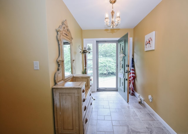 100 Ridgebrook Rd, Torrington, CT 06790 - foyer featuring a chandelier and baseboards