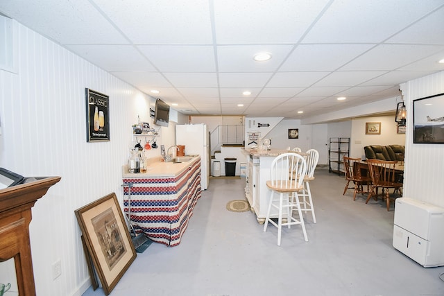 100 Ridgebrook Rd, Torrington, CT 06790 - bar area with finished concrete floors, a sink, recessed lighting, a drop ceiling, and freestanding refrigerator