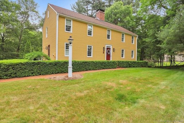 47 Cricket Ln, Somers, CT 06071 - colonial inspired home with a chimney and a front yard