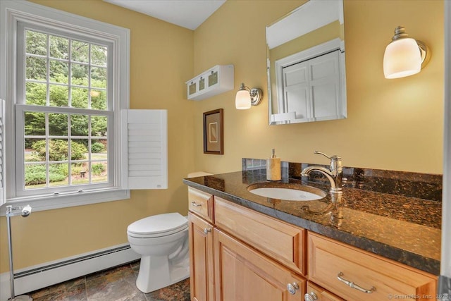47 Cricket Ln, Somers, CT 06071 - half bath with a baseboard heating unit, healthy amount of natural light, vanity, and toilet